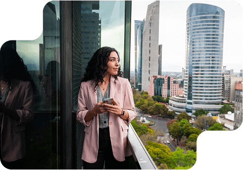 Woman staring out into the city